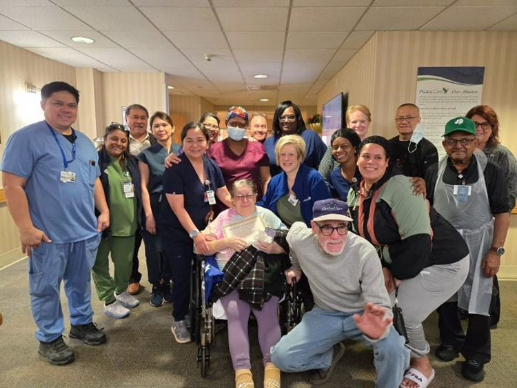 The Peace Care St. Ann's team celebrating a 2025 AHCA/NCAL Bronze National Quality Award